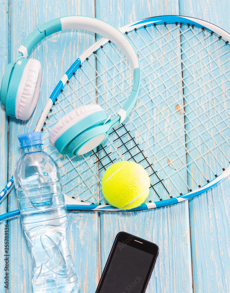 Sports equipment. Sports kit. Tennis racket and ball.
