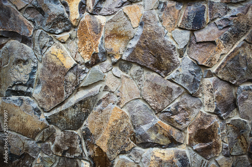 Texture of a stone wall. Old castle stone wall texture background. Part of a stone wall, for background or texture