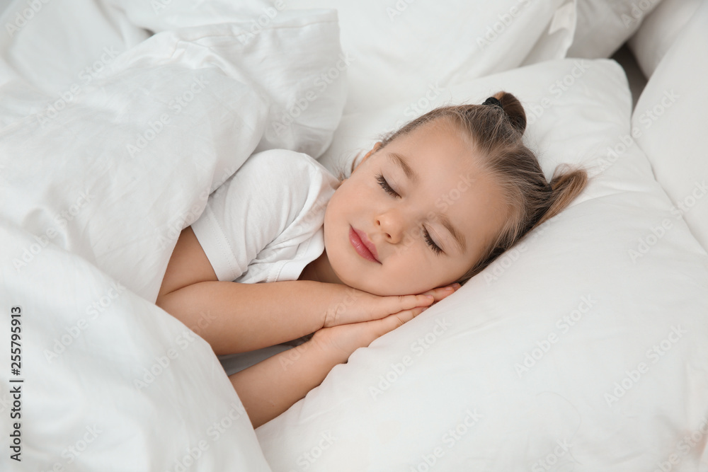 Beautiful little girl sleeping in bed. Bedtime schedule Beautiful little girl sleeping in bed. Bedtime schedule