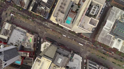 Aerial Overhead Downward View of Buildings in Downtown New Orleans during a parade photo