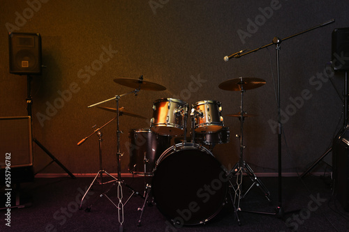 Modern drum set and microphone in recording studio
