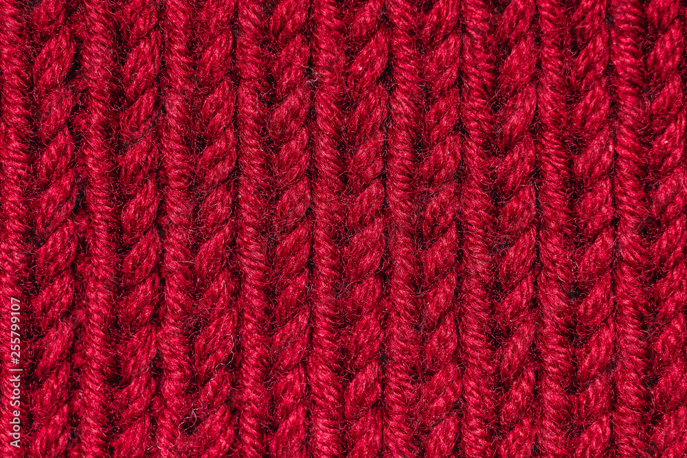 red knitted wool background. textile pattern red knitted wool background. textile pattern