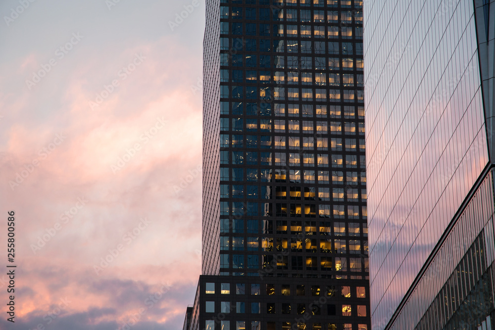 New York City / USA - AUG 22 2018: One World Trade Center exterior reflection at sunset in Lower Manahttan