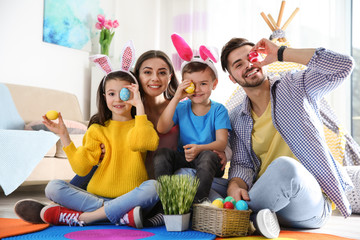Happy family spending time together during Easter holiday at home