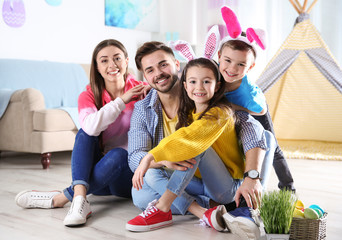 Happy family spending time together during Easter holiday at home