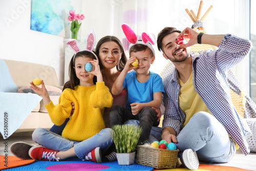 Happy family spending time together during Easter holiday at home