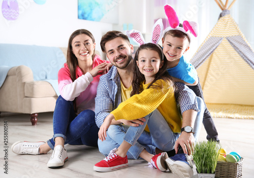 Happy family spending time together during Easter holiday at home