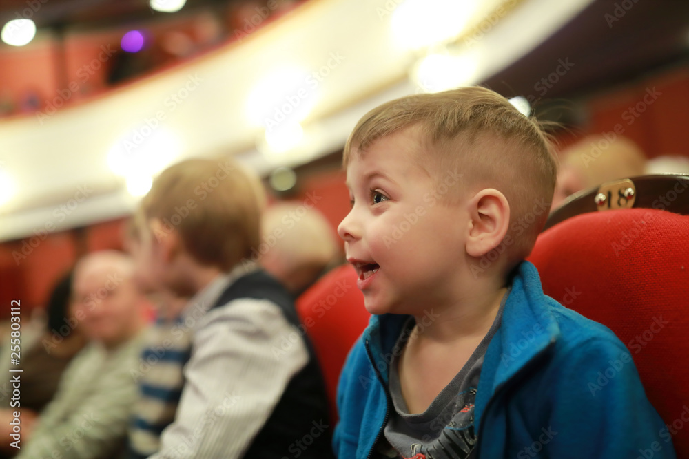 Obraz premium Smiling boy in theater