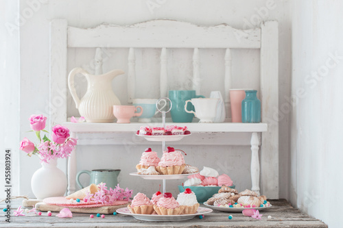 pink cakes on plate on white background