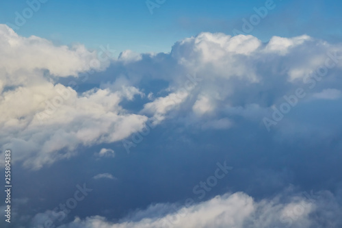 Fototapeta Naklejka Na Ścianę i Meble -  White clouds from airplane at the morning