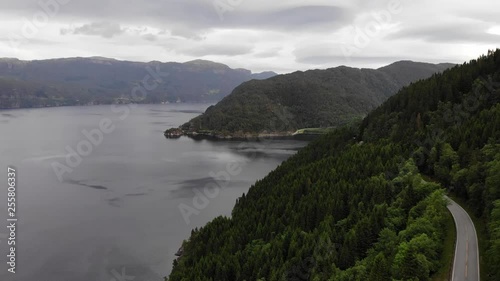 Aerial view. Norwegian landscape. Road in Mountains and fjord Saudafjord, evening time, overcast weather. National tourist Ryfylke route photo