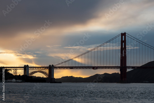 Clouds behind the Golden Gate Bridge at sunset.