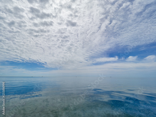 Low dense clouds over the sea. © Dmitrii Potashkin
