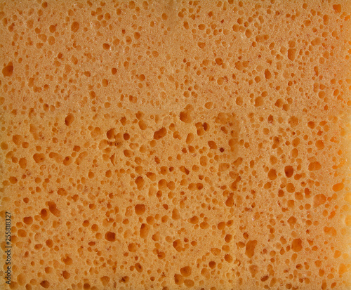 texture of yellow kitchen sponges for washing dishes