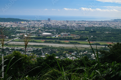 Aereal view of Kaohsiung city from local hiking trail.. photo