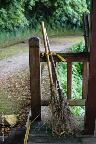 Old Wooden Broom On Porch By Hiking Trail in Taiwan photo