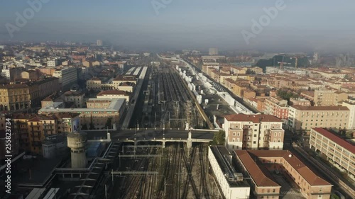 Aerial view of Bologna Centrale railroad station within cityscape, Italy photo