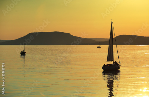 Sailing boats on Lake Balaton at sunset 