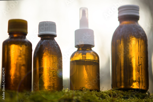 Amber medical bottles - alternative medicine. photo