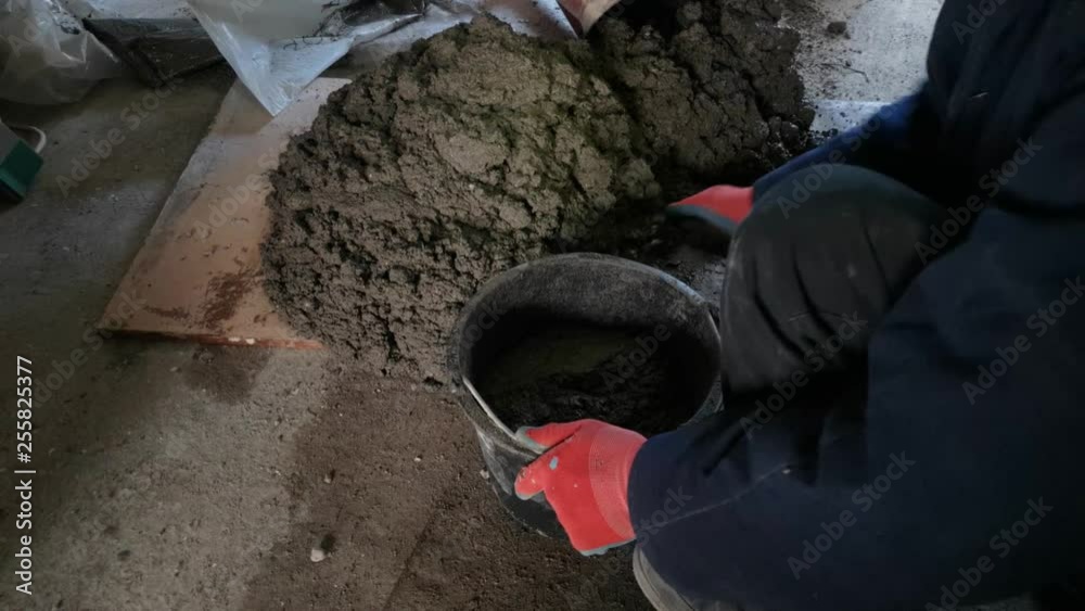 Production of concrete mortar by hand for building work Production of concrete mortar by hand for building work
