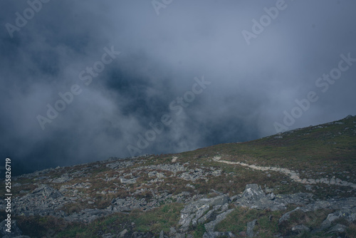 Mysterious hiking trail in the mountains