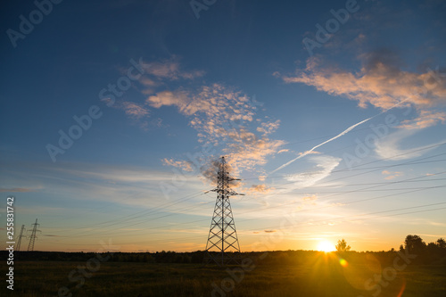 electricity pylons at sunset