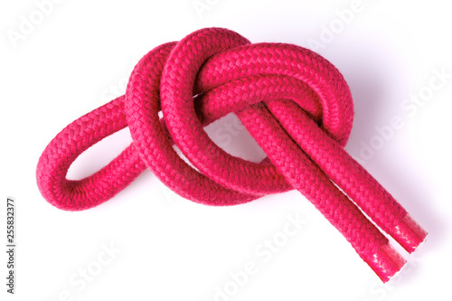 Red rope. Jump rope for rhythmic gymnastics. Close-up.
