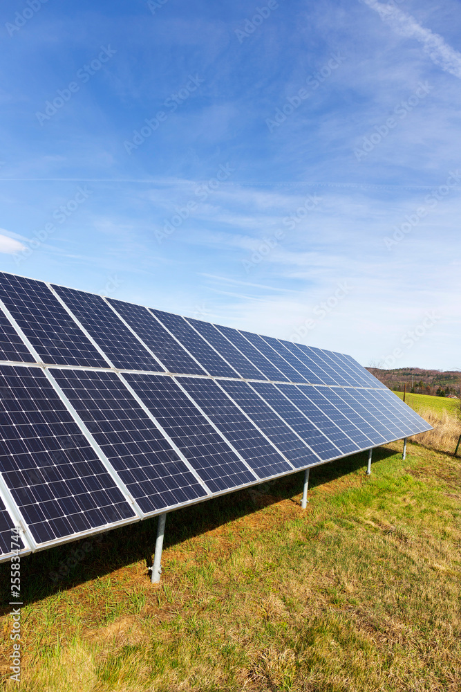 Solar Power Station on the early spring Meadow 