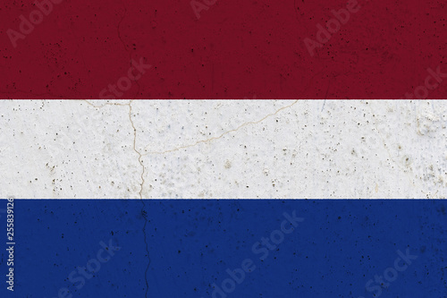 netherlands flag on concrete wall