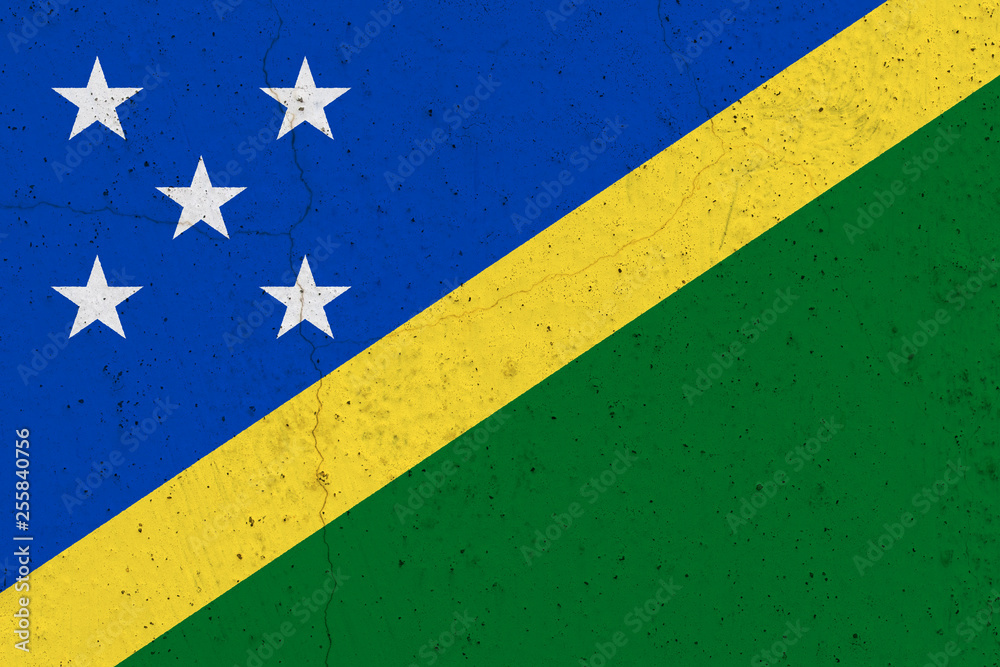 Solomon Islands flag on concrete wall