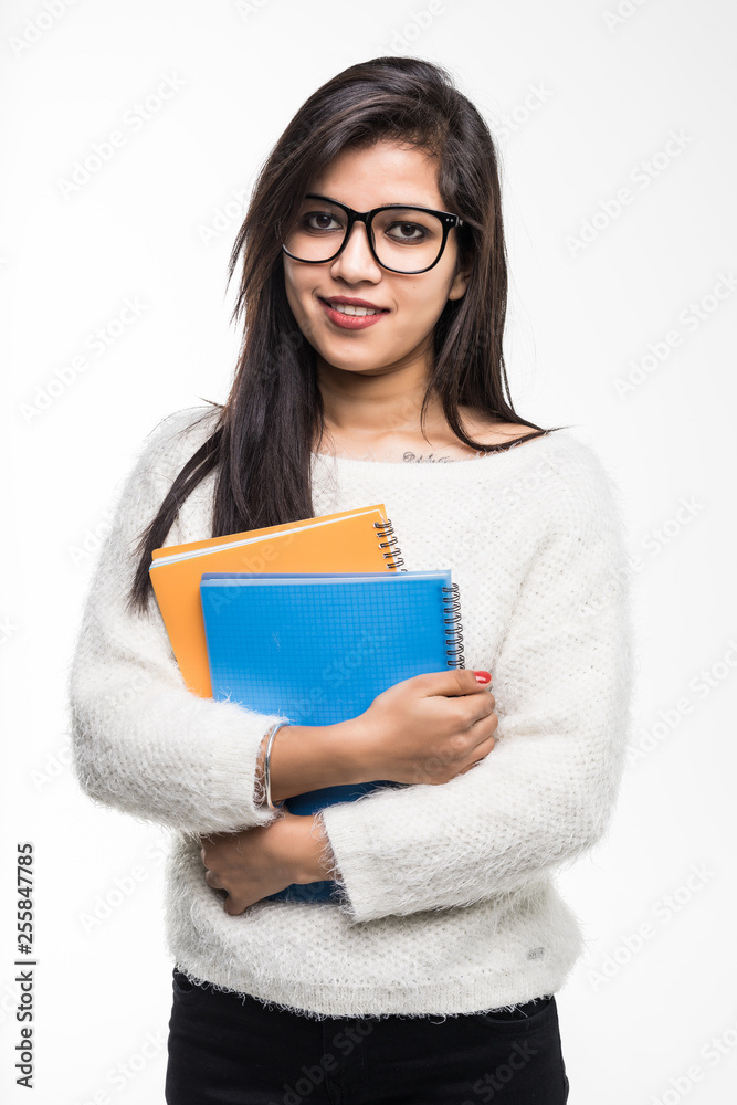 Indian student holding book isolated on white background Stock Photo ...