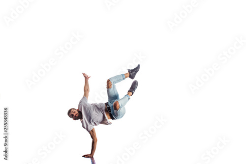Carefree man doing breakdance