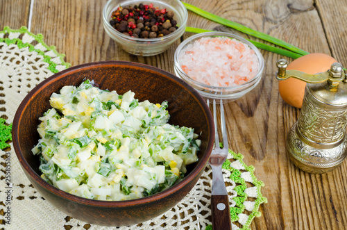 Salad with egg and green onions, vegetarian dishes.