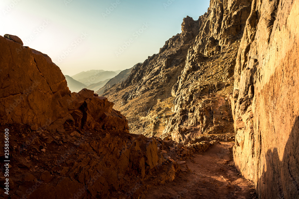 Obraz premium Middle East or Africa, picturesque bare mountain range and a large sandy valley desert landscapes landscape photography