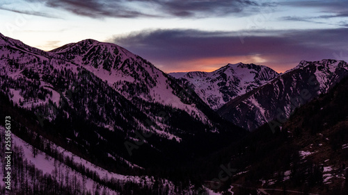 mountains at sunset in ski resort isola 2000, france