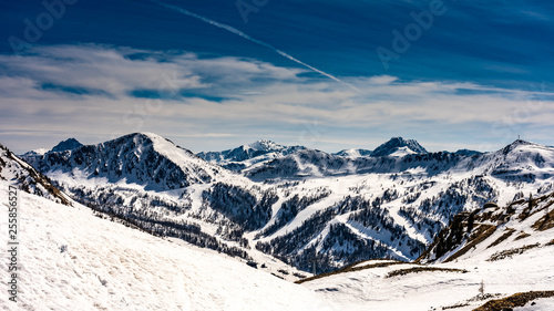 snowy mountains panorama in ski resort isola 2000, france photo