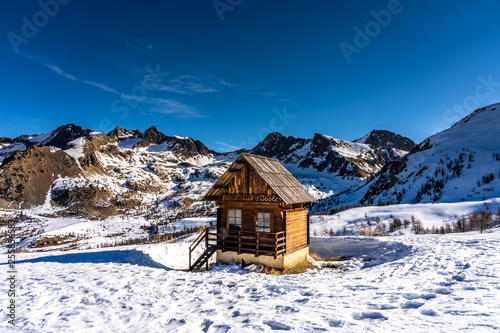 wooden hut in mountains in ski resort isola 2000, france