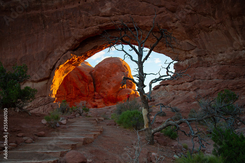Rocks on fire behind the arch.