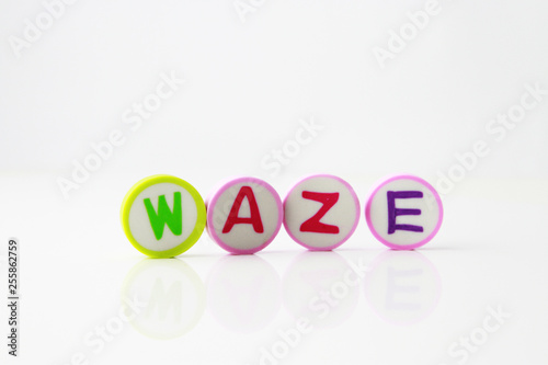 Alphabet printed on the round shape eraser background photo