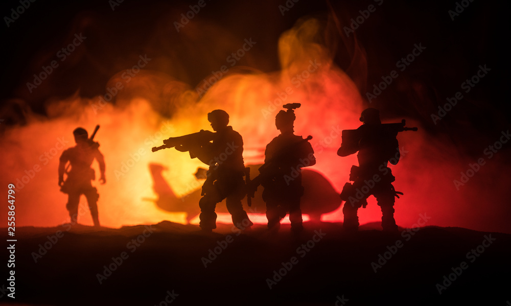Artwork decoration. Soldiers in the desert during the military operation with combat helicopter or Helicopter assault special forces. Artwork decoration. Soldiers in the desert during the military operation with combat helicopter or Helicopter assault special forces.
