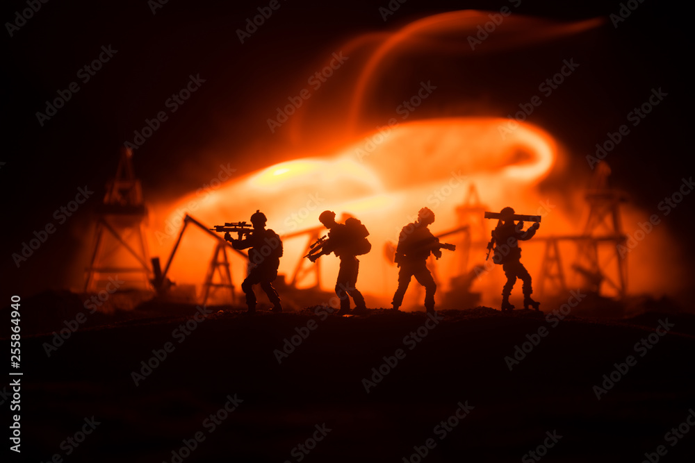 Silhouette of military soldier or officer with weapons. shot, holding gun, colorful sky, background. war and military concept.
