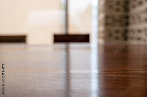 Wooden table and chairs with blurred background