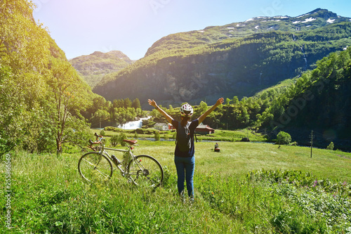 Canvas Print people ride bicycle on mountain road at flam Norway