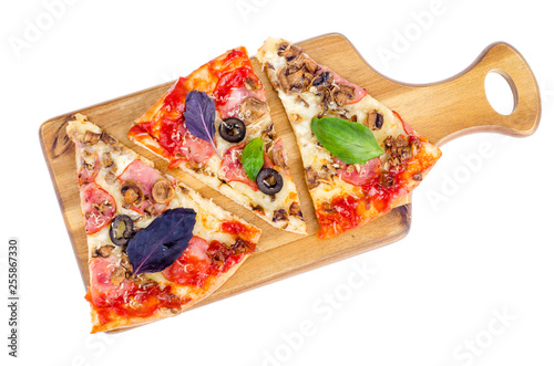 Kitchen wooden board with pizza slices isolated on white background.