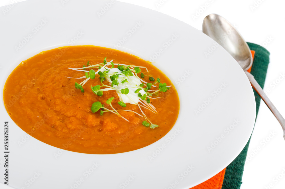 Vegetarian pumpkin soup puree with cress salad greens. Vegetarian pumpkin soup puree with cress salad greens.