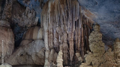 Ancient rock formations - stalactites and stalagmites in the cave in Central Vietnam.