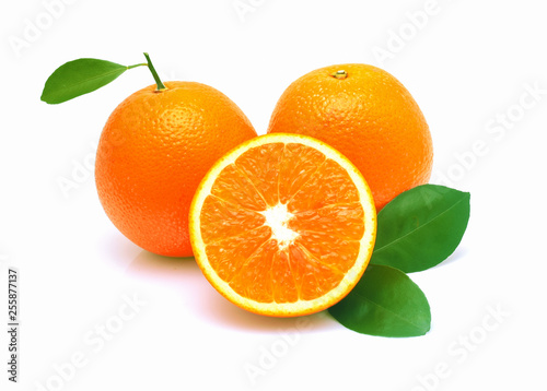 Orange fruit with leaf isolated on white background