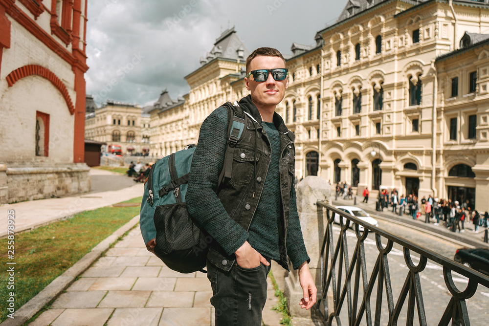 Tourist with backpack on Red Square, Moscow, Russia Tourist with backpack on Red Square, Moscow, Russia