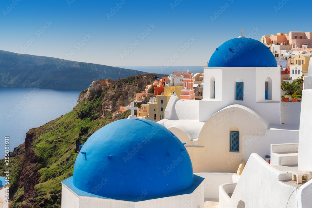 Santorini blue and white domes churchs on Greek Island, Oia town, Santorini, Greece.