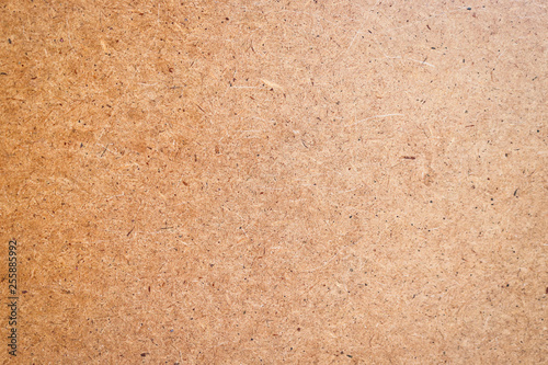 The texture of the fiberboard. Front side. Abstract background with copy space.